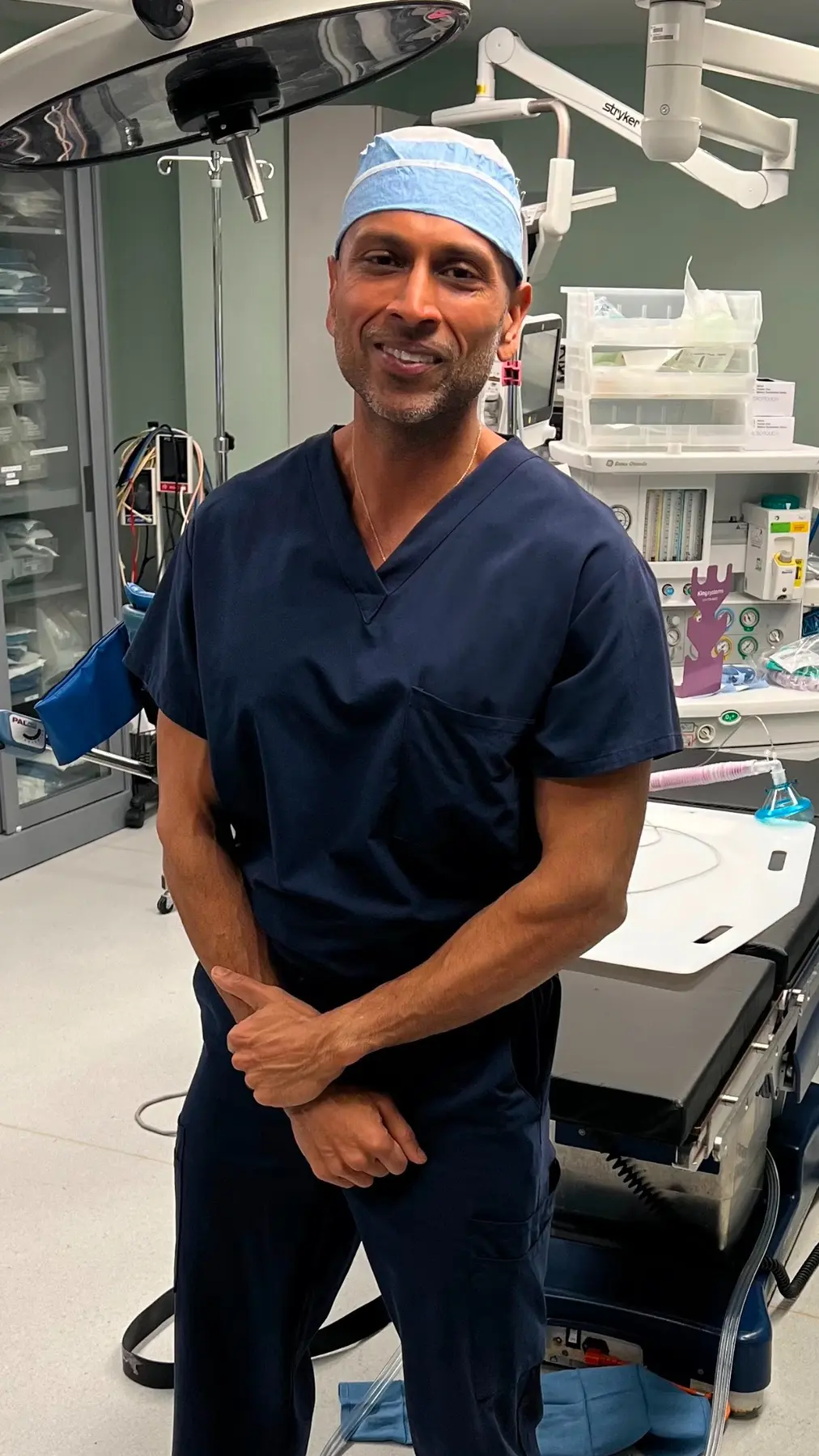 Dr. Manuj Agarwal in an operating room during prior clinical work