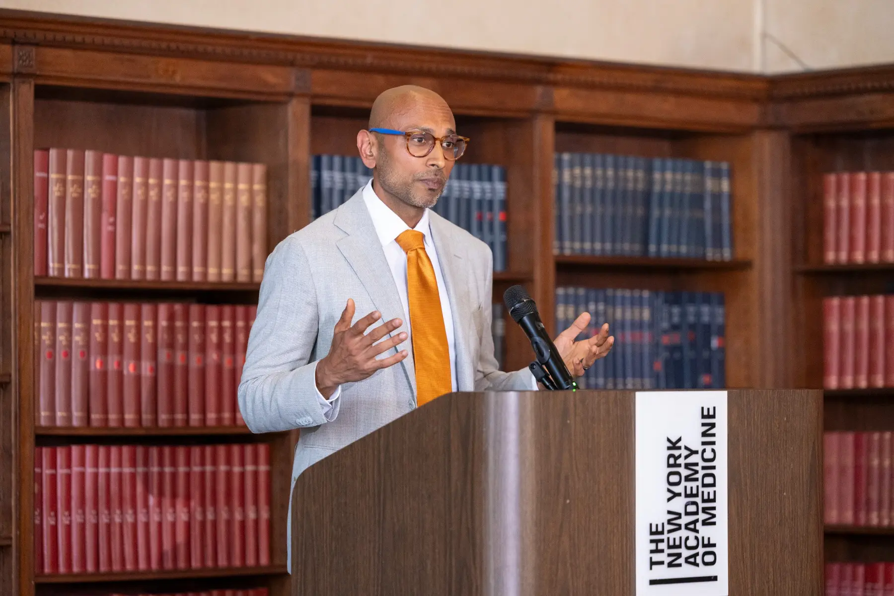 Dr. Manuj Agarwal speaking to a professional audience